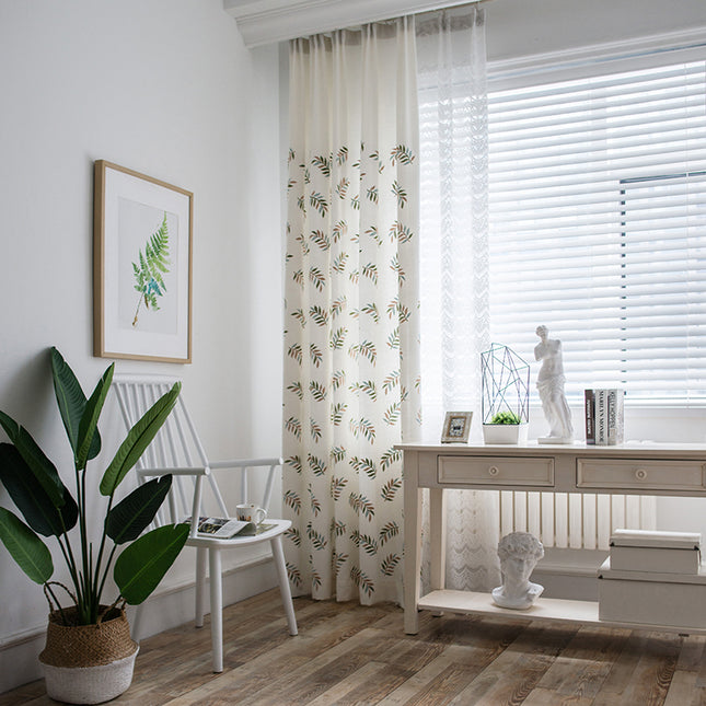 Draped view of the Melodieux rod pocket embroidered curtain